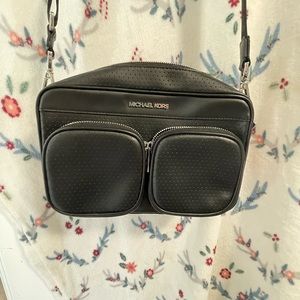 Michael Kors crossbody bag, lightly used, zipper closure.
